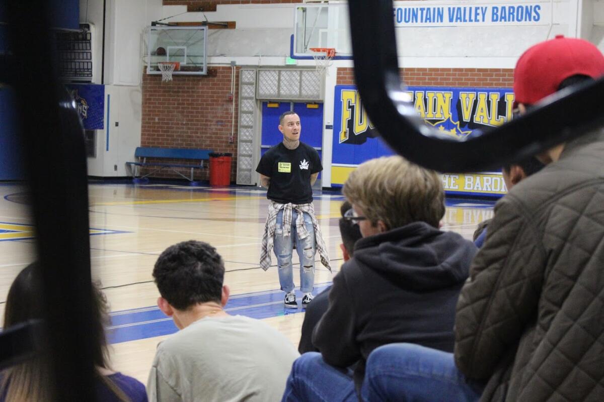 Youth pastor and Fountain Valley High School alumnus Manny Gallegos Jr. speaks to students.