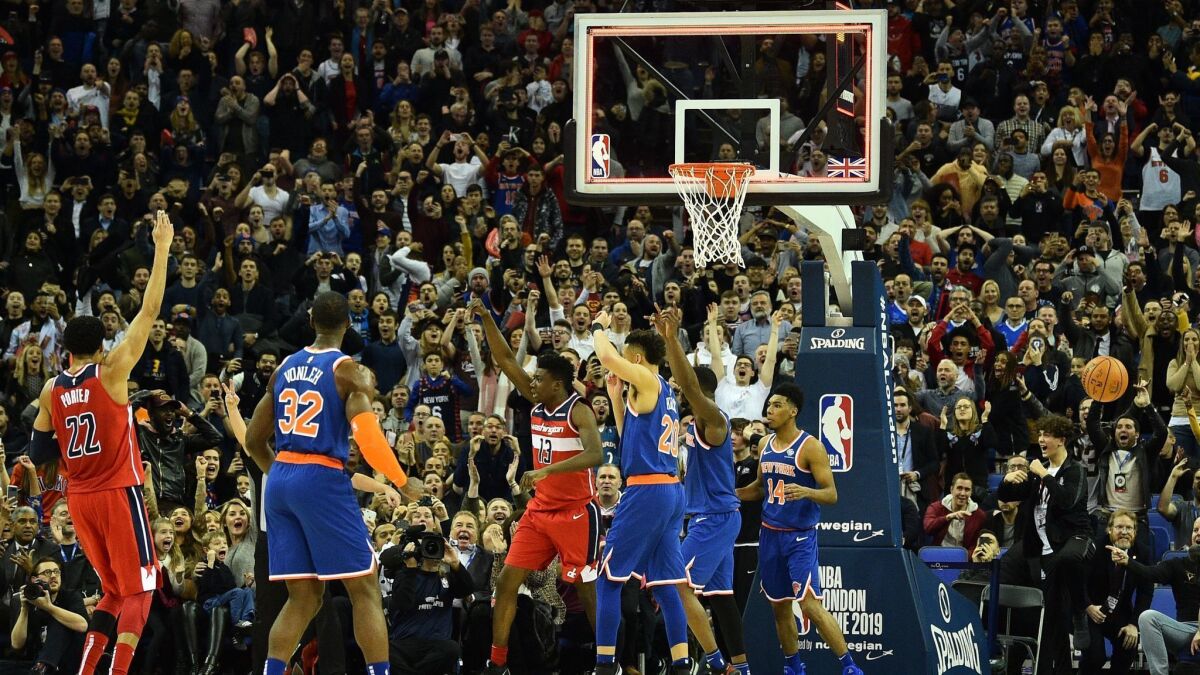 Players react after a goaltending call at the end of the NBA London Game between Washington Wizards and New York Knicks at the O2 Arena.