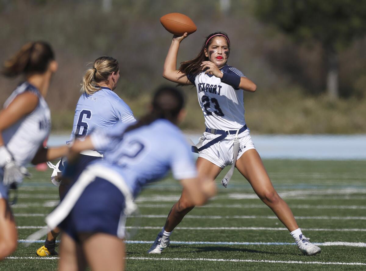 Newport Harbor quarterback Maia Helmar throws against Corona del Mar on Monday.