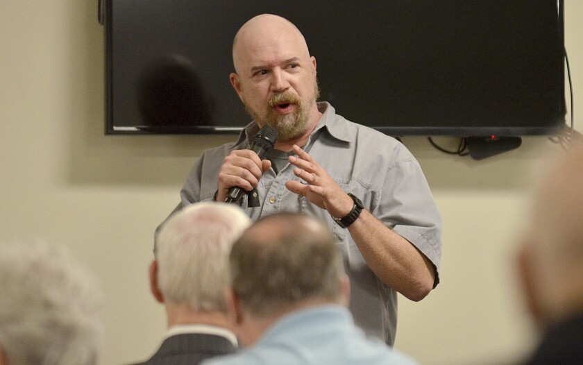Terre Haute Police Det. Greg Ferency gives a presentation during the protecting places of worship forum on April 12, 2019, at St. George's Orthodox Church in Terre Haute, Ind. Ferency, a 30-year department veteran who had been a federal task force officer since 2010, was killed in an ambush shooting outside an FBI office in western Indiana, an FBI official said Thursday, July 8, 2021. (Joseph C. Garza/The Tribune-Star via AP)