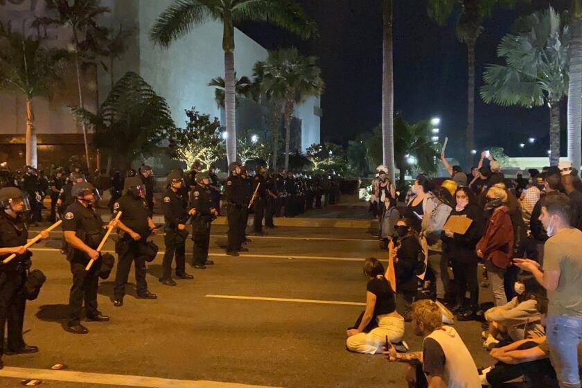 There was a series of standoffs between protesters and police at a rally at South Coast Plaza late Monday night.