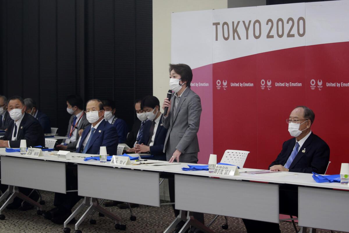 Tokyo 2020 Organizing Committee President Seiko Hashimoto, center, speaks during a Tokyo 2020 executive board meeting in Tokyo, Tuesday, March 2, 2021. (AP Photo/Koji Sasahara, Pool)