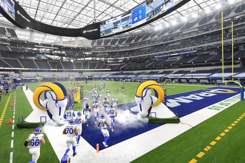 INGLEWOOD, CALIFORNIA SEPTEMBER 13, 2020-Rams players take the field before a game against the Cowboys.