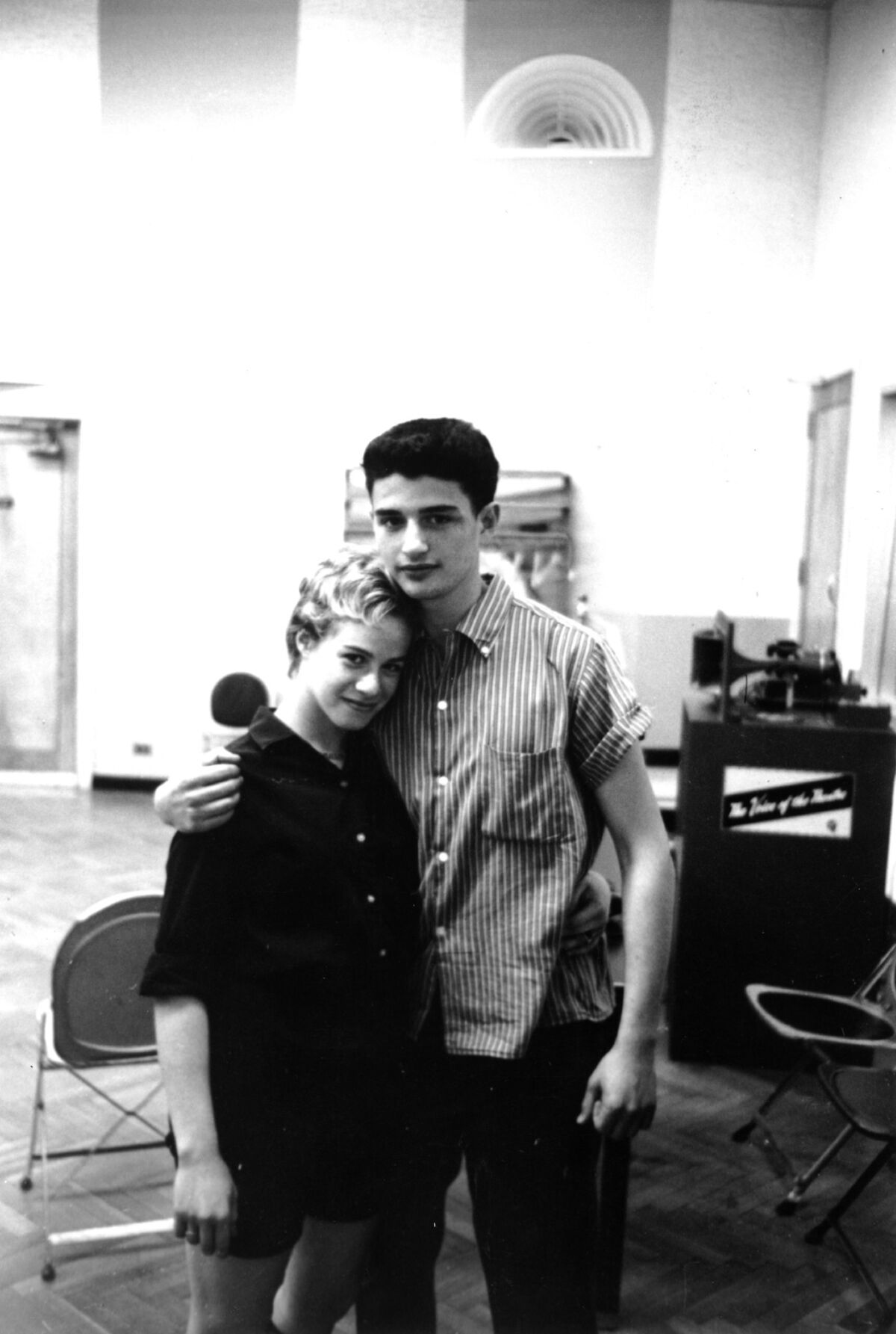 Husband and wife songwriting team Carole King and Gerry Goffin pose in a recording studio in New York, circa 1959.