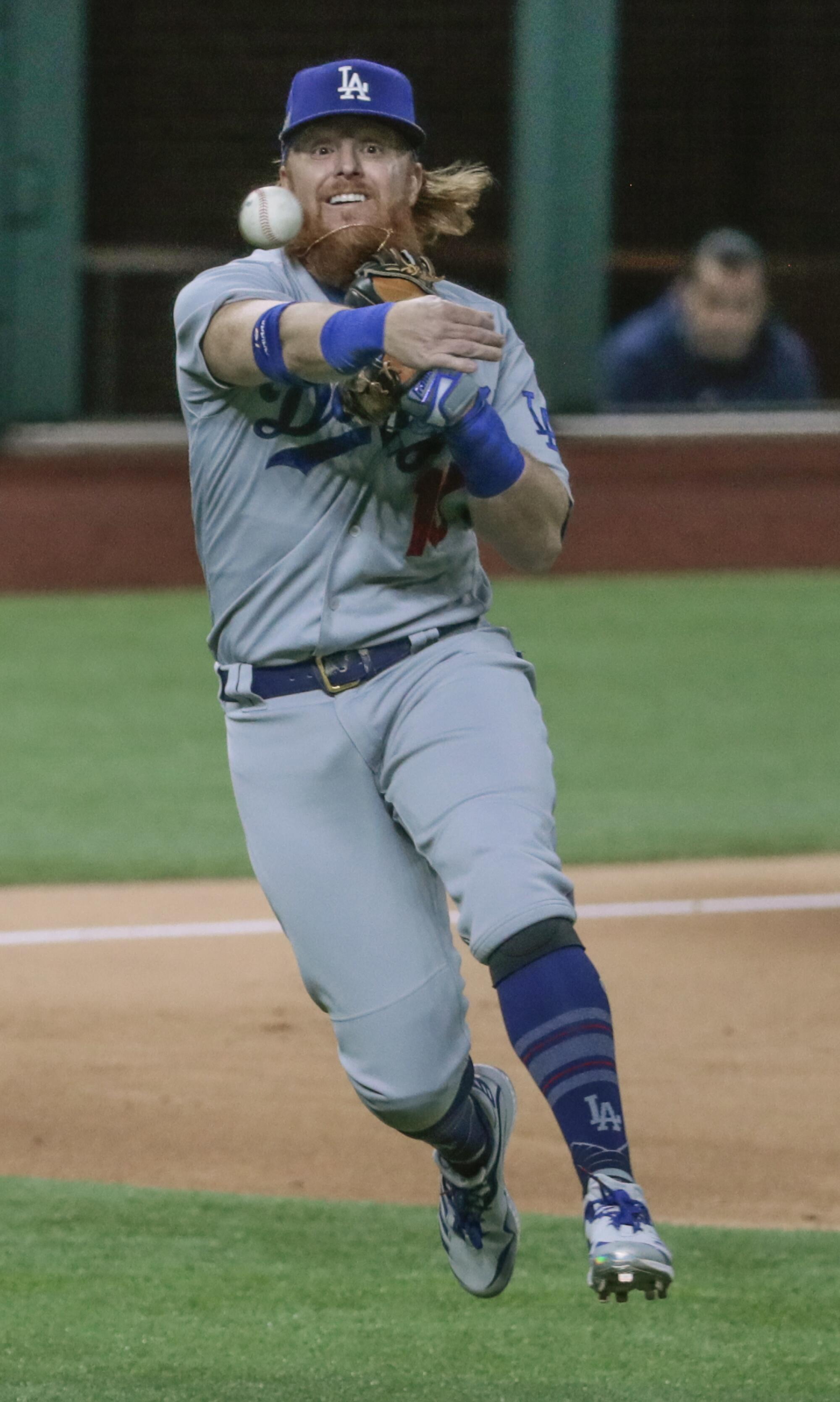 Dodgers third baseman Justin Turner makes a throw during Game 4 of the NLCS.