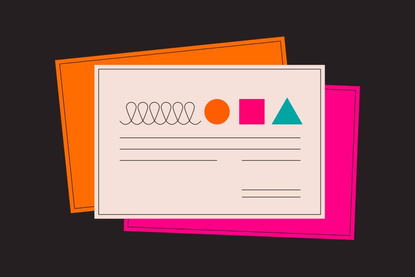 A stack of business cards with shapes that represent letters.