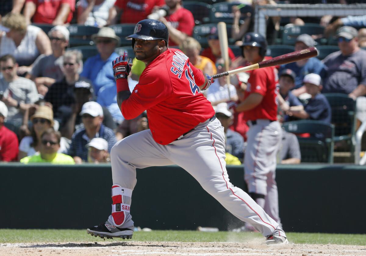 Red Sox third baseman Pablo Sandoval grounds out during a spring training game.