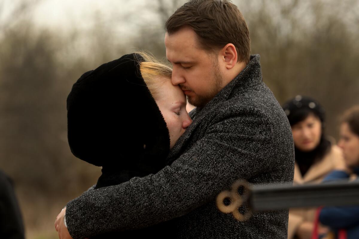 50 people gathered for the funeral of a well-known family who all died in a Russian missile attack.