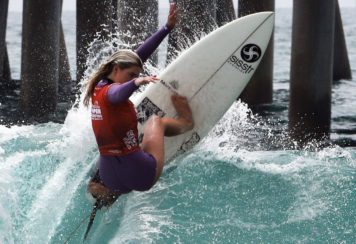 Sawyer Lindblad of San Clemente works a wave during the U.S. Open of Surfing women's final on Sunday.
