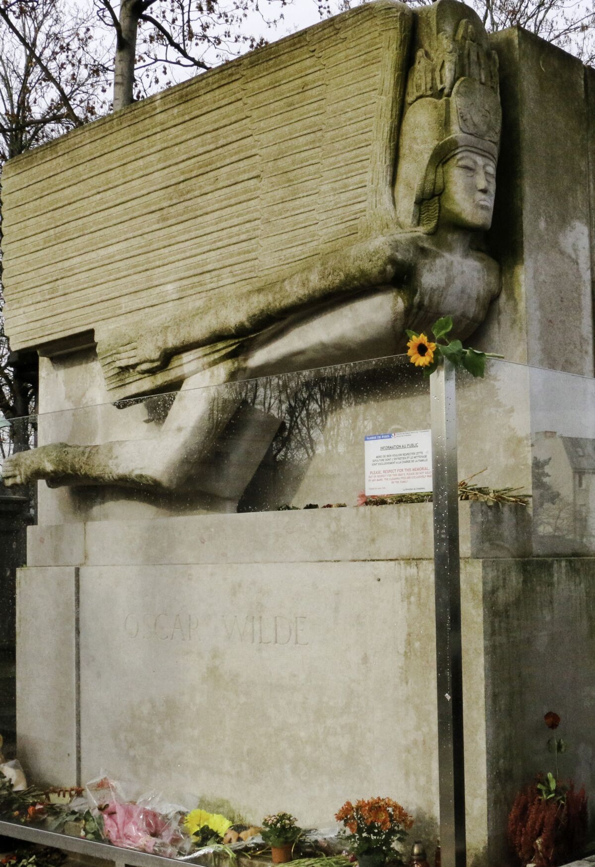 The tomb of Oscar Wilde, sculpted by American artist Jacob Epstein, at Père-Lachaise Cemetery in Paris.