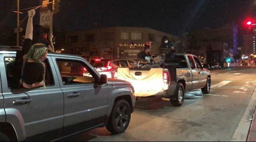 The Pico Rivera hardcore band Vandalize performed from the back of a pickup truck during Saturday's protests.