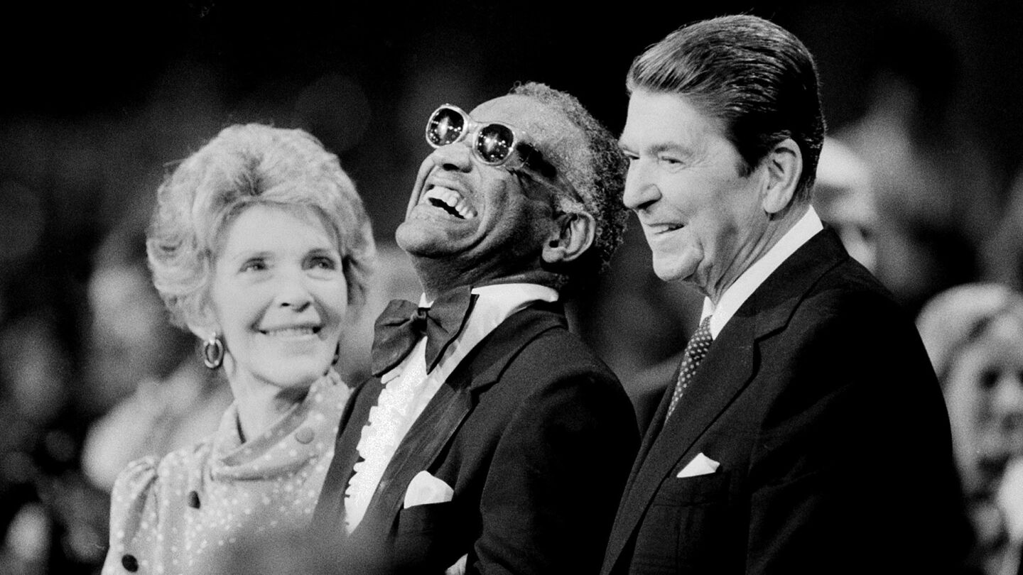 The Reagans with music legend Ray Charles at a musical salute in Washington in March 1983.