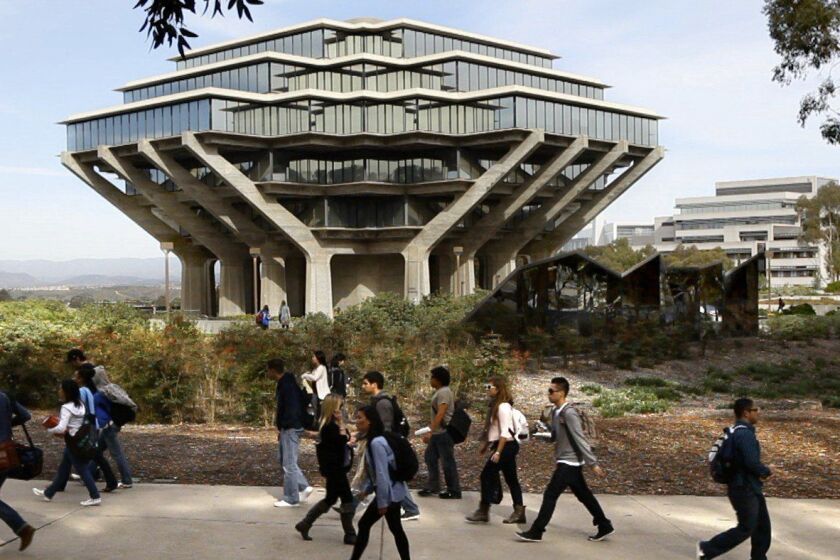 Students at the University of California San Diego walk by the Geisel Library on campus in this 2010 file photo.