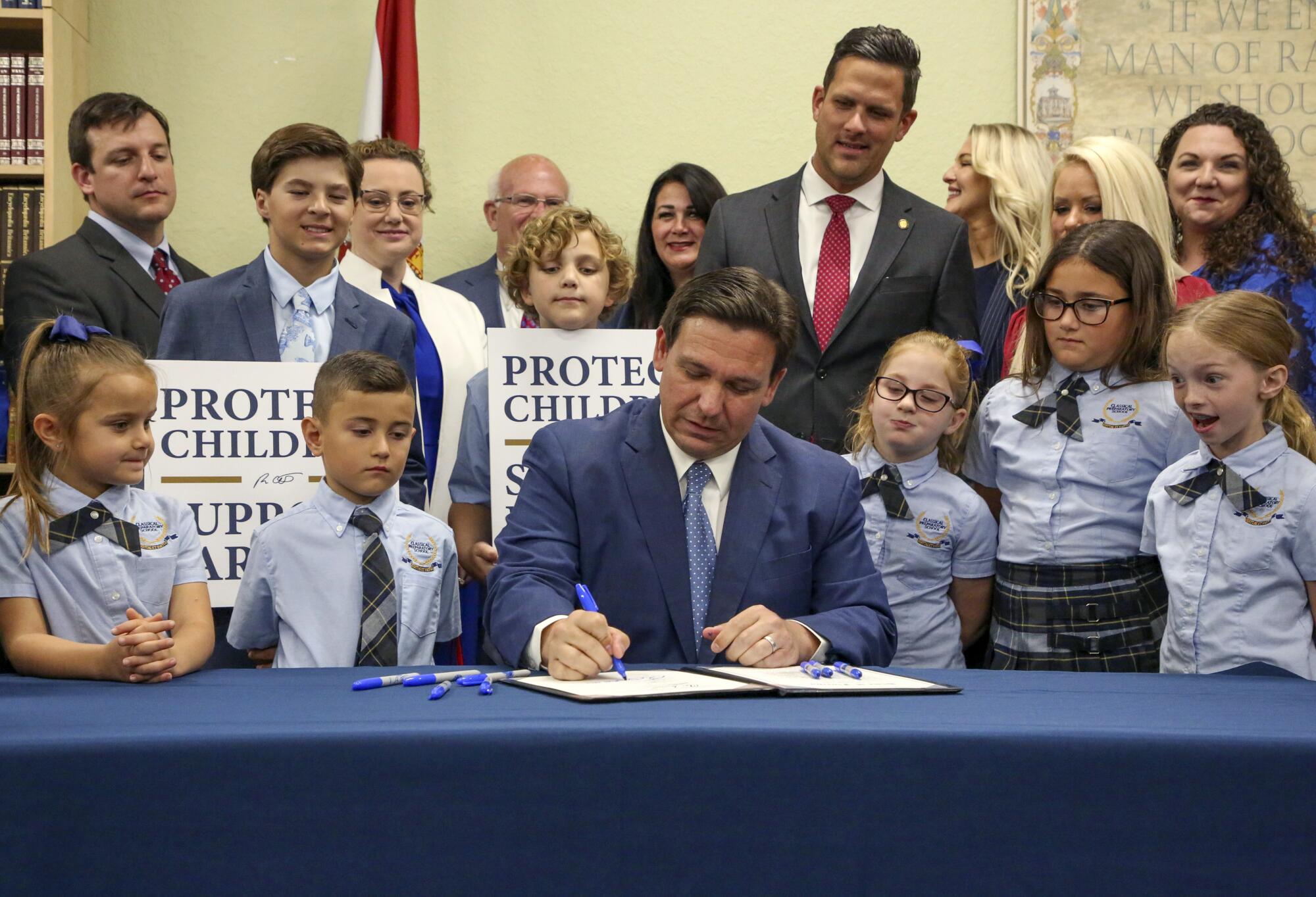 Florida Gov. Ron DeSantis signs the Parental Rights in Education bill, in Shady Hills, Fla. 