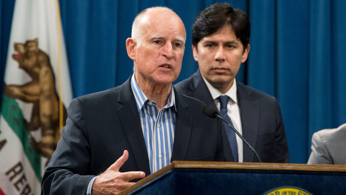 Gov. Jerry Brown announced during a news conference Wednesday that he would sign a pair of environmental bills approved by the Legislature that would reduce carbon emissions.