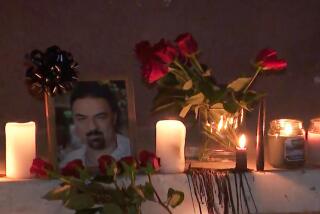 A growing memorial is made outside a Woodland Hills clinic after a doctor was shot and killed on Friday, August 23, 2024.