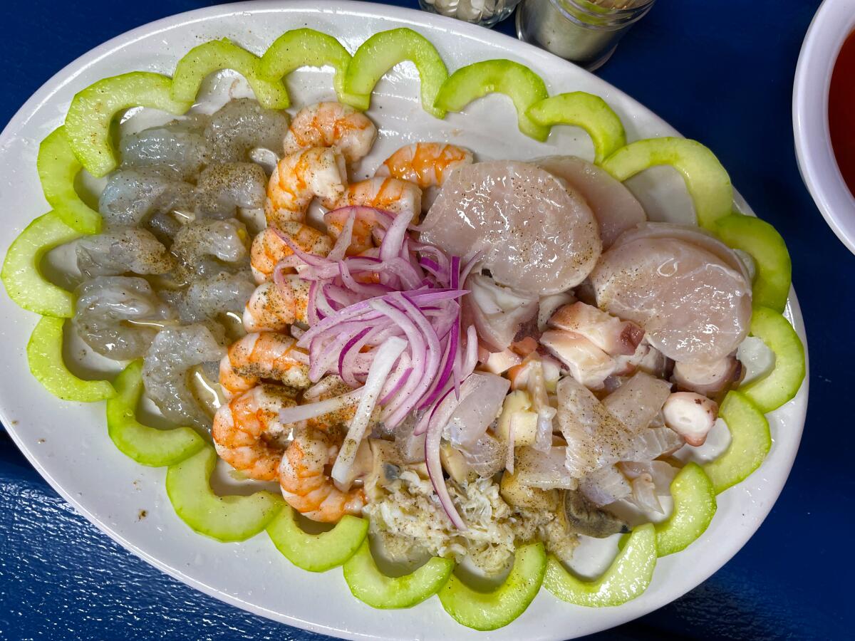 A platter filled with seafood.
