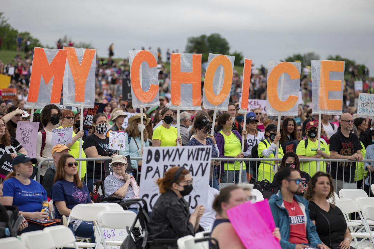 Abortion rights demonstrators rally, Saturday, May 14, 2022, on the National Mall in Washington.