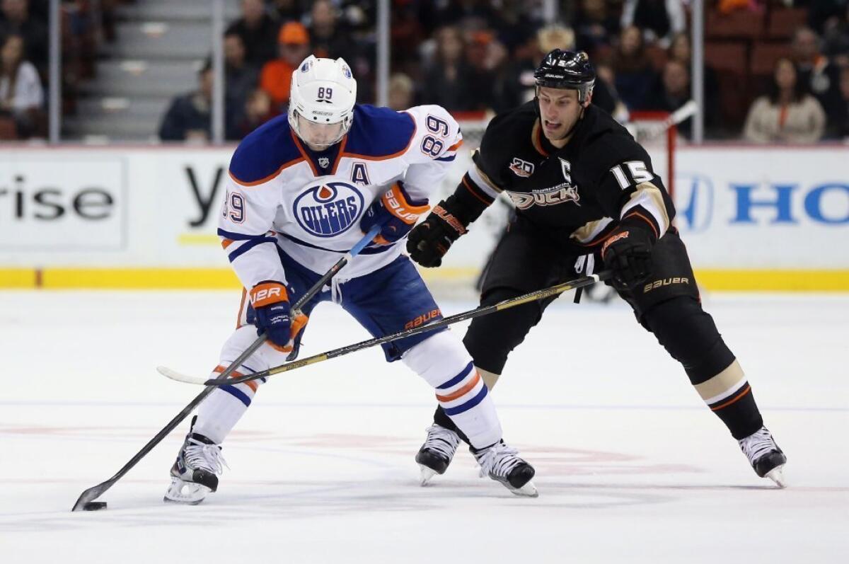 Sam Gagner, left, is pursued by Ryan Getzlaf of the Ducks in a Jan. 3 game.