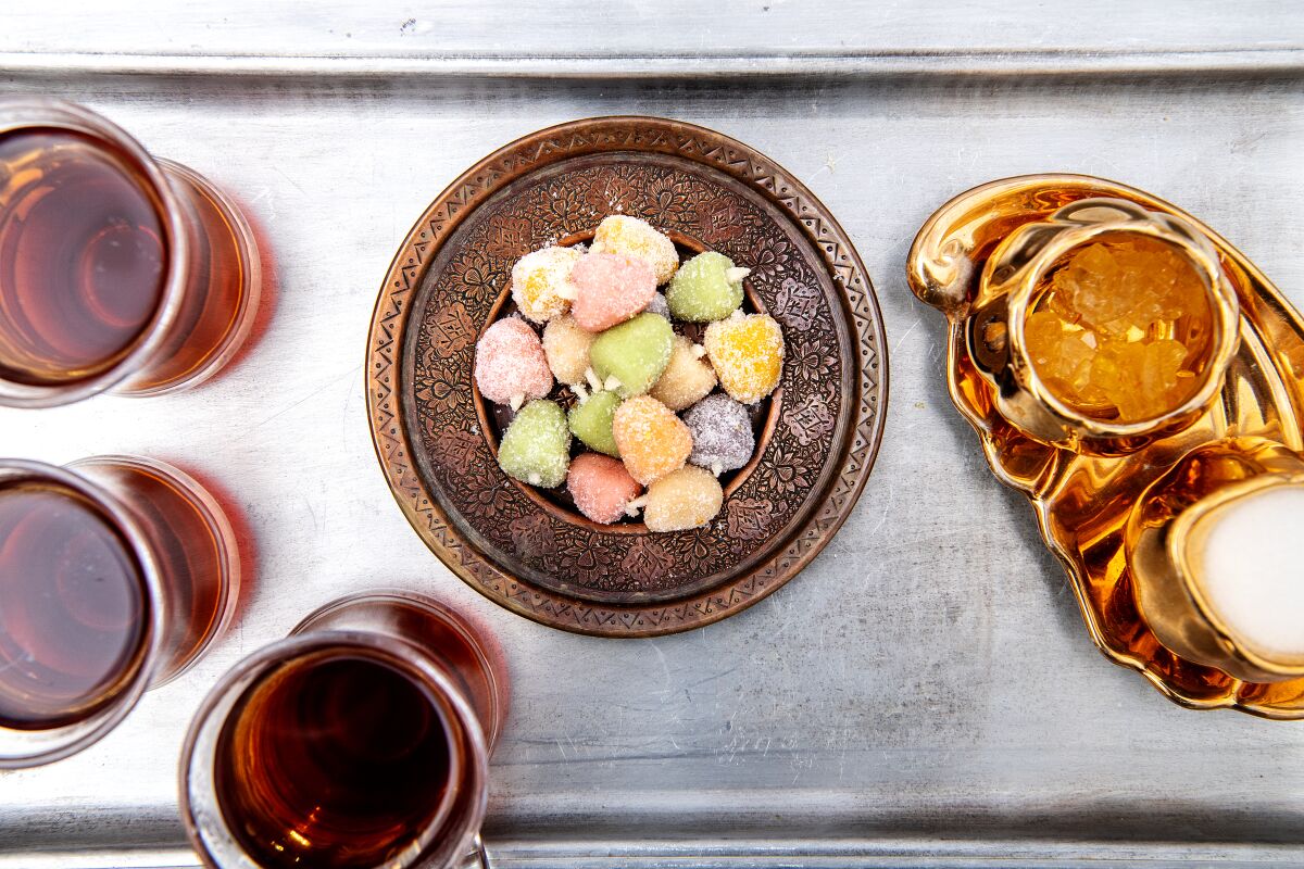 A tray of items set out to celebrate Nowruz, meant to sweeten the year to come.