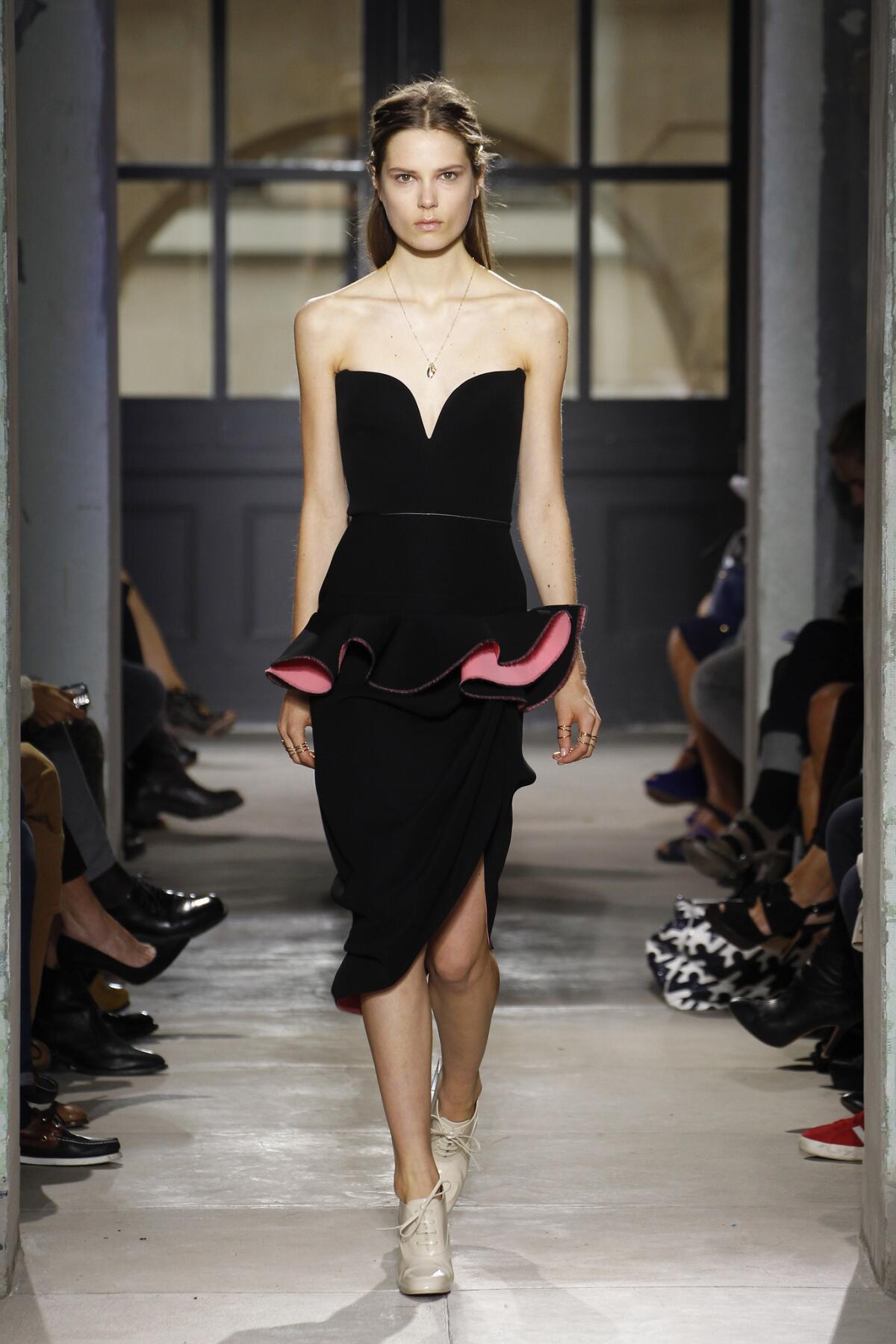 Looks from the Balenciaga spring-summer 2013 runway show during Paris Fashion Week.