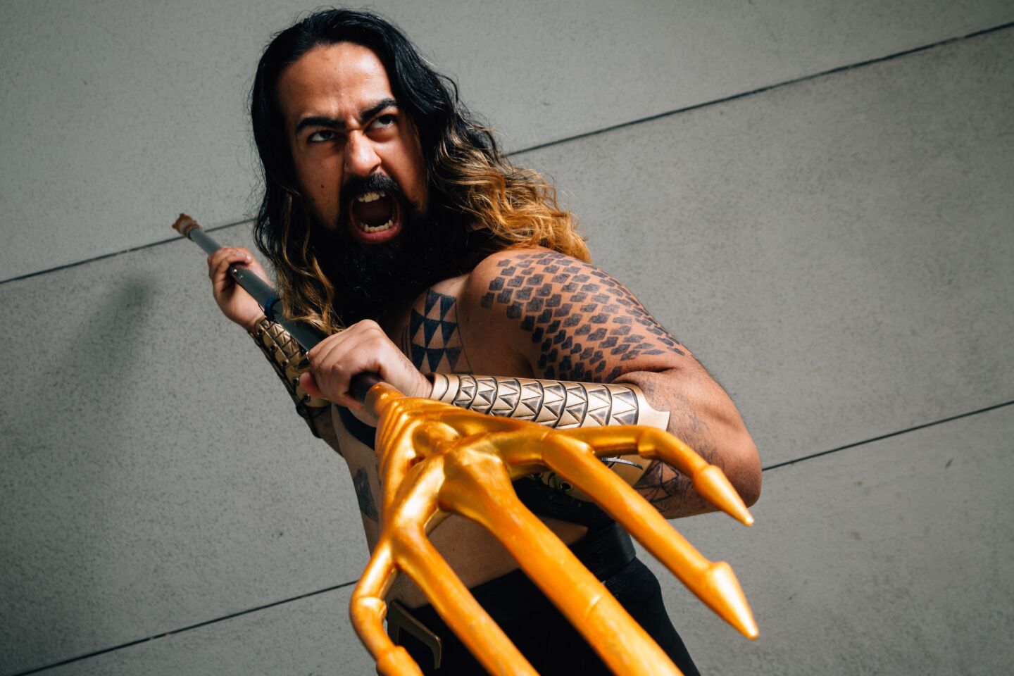 Shad Armstrong, 29, of Los Angeles, cosplays as DC’s Aquaman (the Jason Momoa movie version).