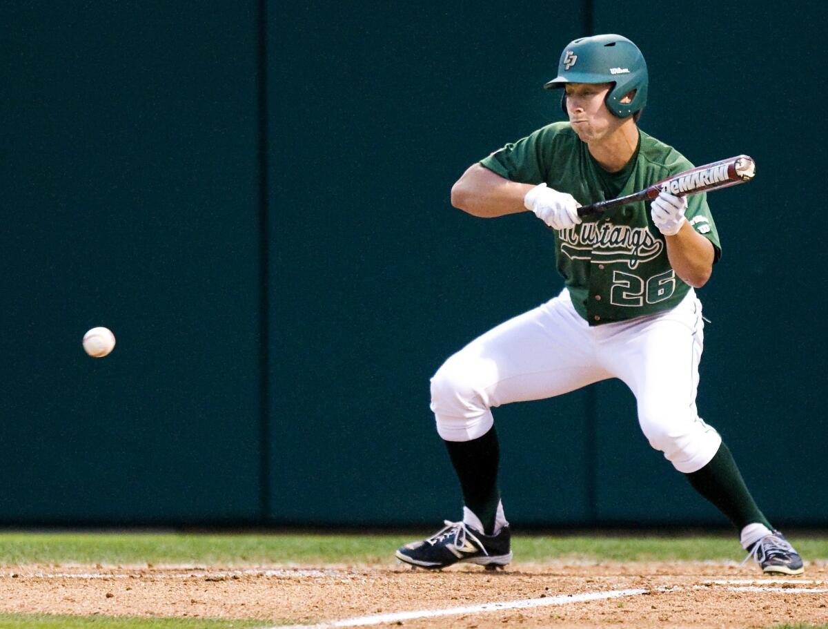 Cal Poly's Jordan Ellis lays down a sacrifice bunt in the fifth inning against Cal State Fullerton during a game April 18. Both teams are in the NCAA Division I tournament.