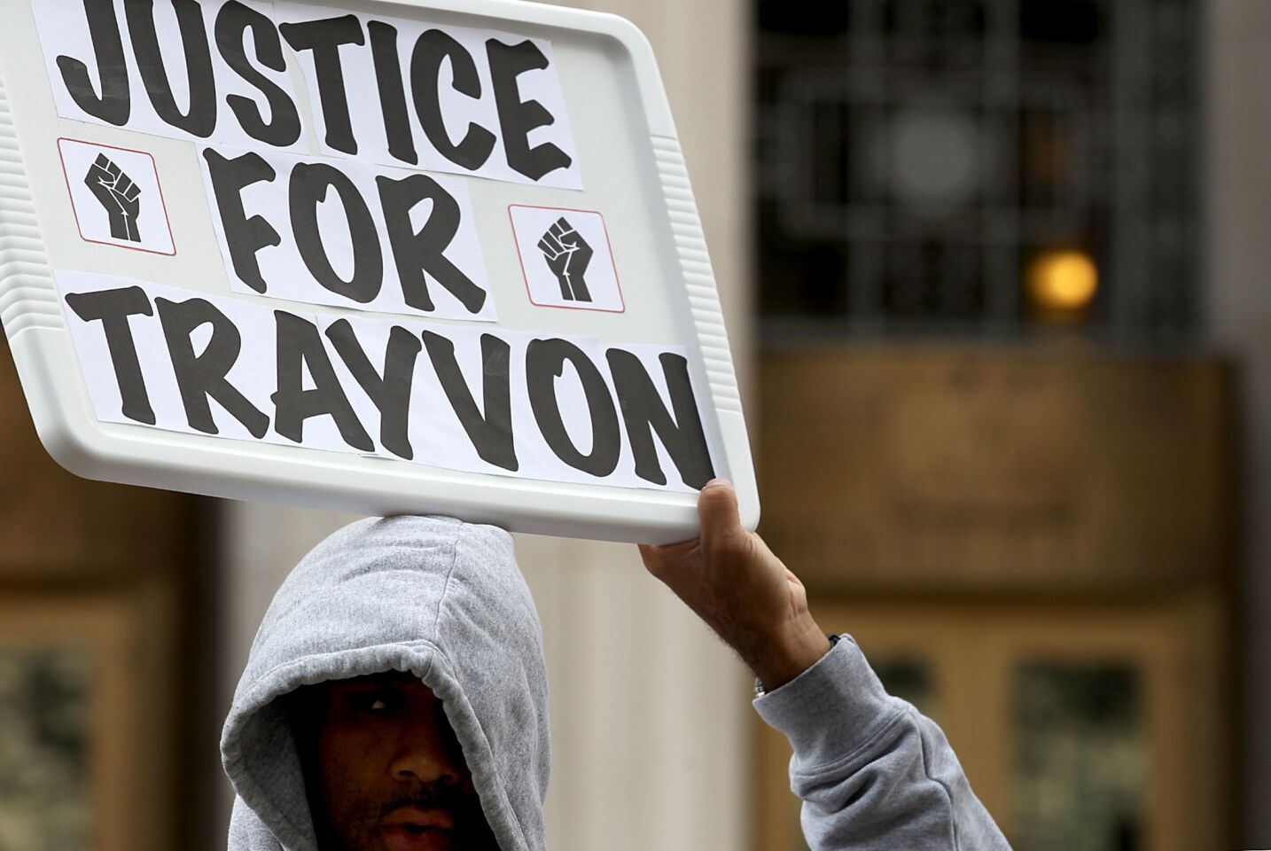 Adam Smith, 43, wears a hoodie at the protest and march in downtown Los Angeles. Trayvon Martin was wearing a hoodie the night he was killed.