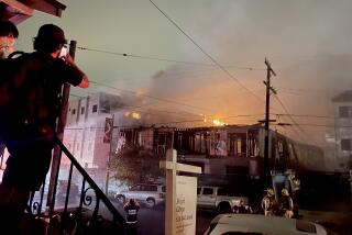 Photograph of a fire and its aftermath at a construction site on New Depot Street on Sept. 13, 2024. The fire spread to nearby homes and displaced residents.