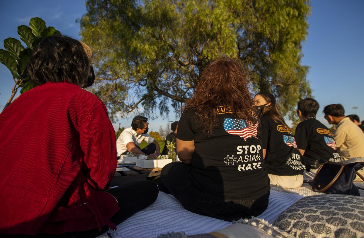 Victims of anti-Asian hate attacks and supporters meet for a peaceful picnic in Fountain Valley Sports Park.
