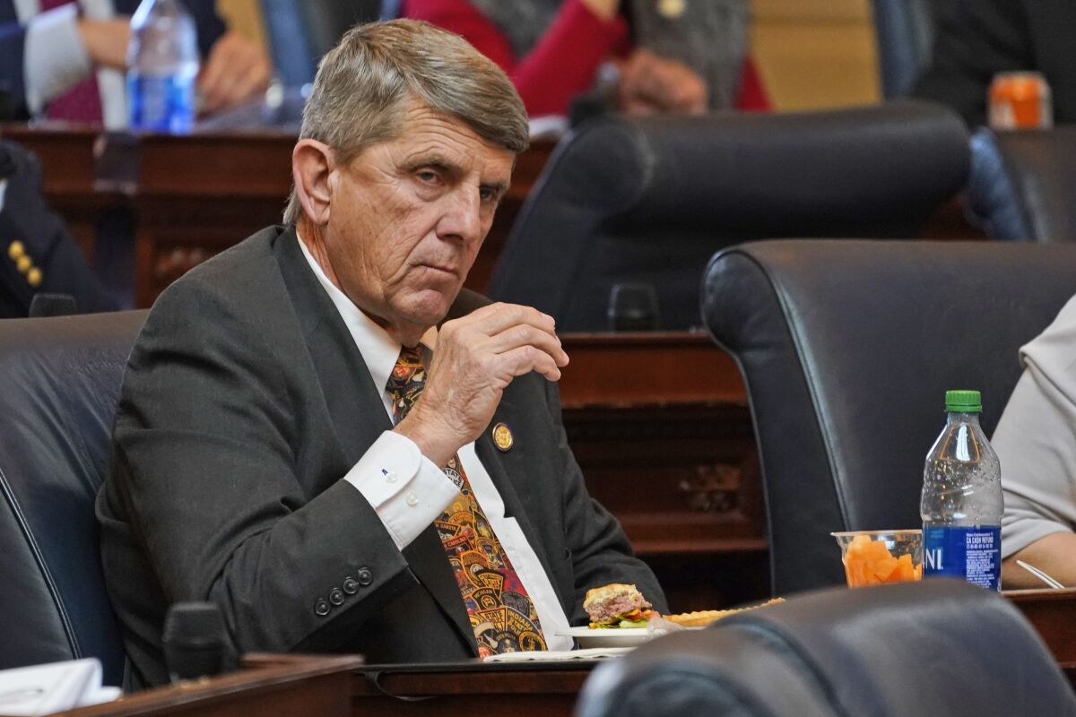 Virginia Del. Ronnie Campbell, R-Rockbridge, listens to proceedings during the session at the Capitol Tuesday Feb 8, 2022, in Richmond, Va. Campbell sponsored a bill that would repeal a 2020 law that prohibits police from stopping motor vehicles for minor offenses such as operating without brake lights or driving with defective equipment. (AP Photo/Steve Helber)