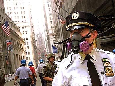 An NYPD officer keeps the peace on Wall Street