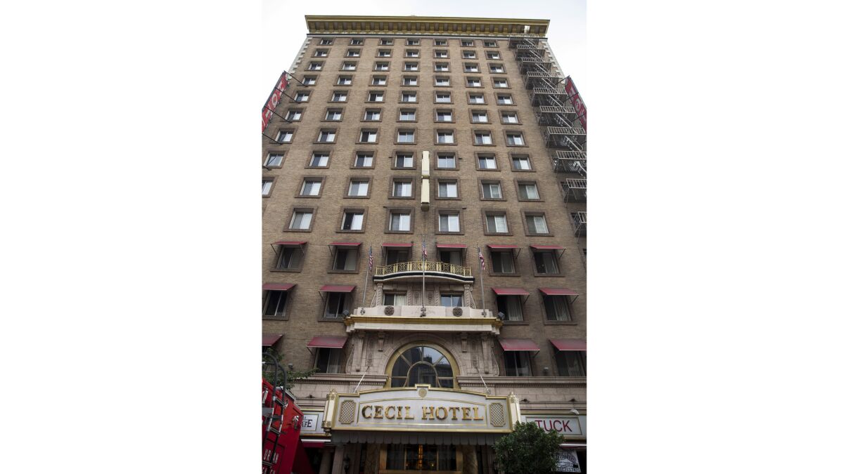 A young man may have plunged to this death from the Cecil Hotel downtown, seen in 2013, on Friday, authorities said.