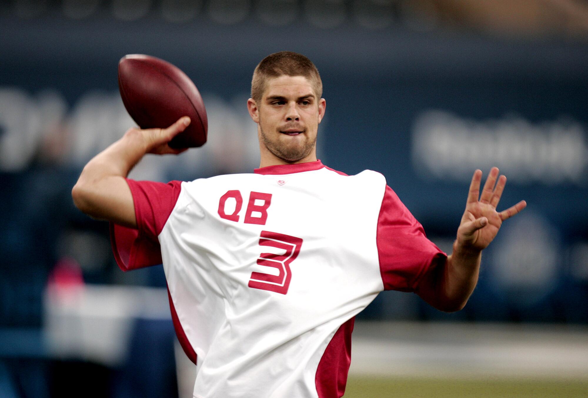 Quarterback Colt Brennan of Hawaii runs a drill at the NFL Combine in Indianapolis in 2008.