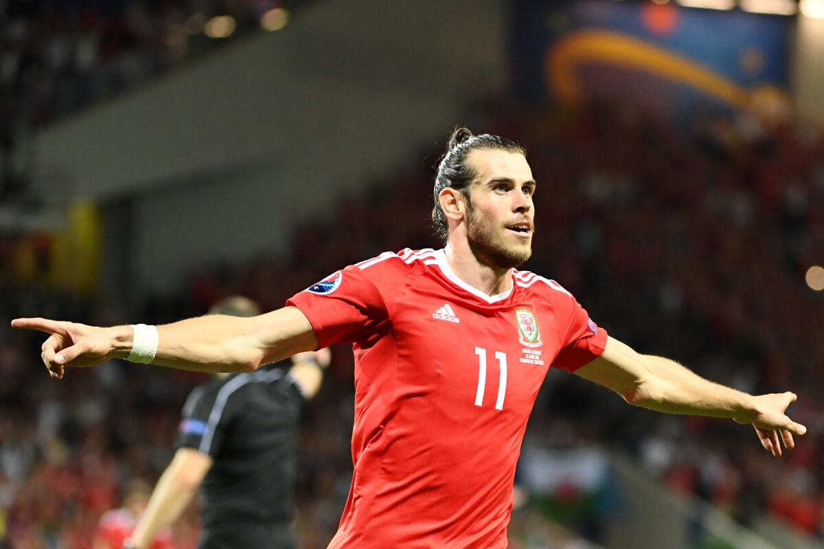 Wales forward Gareth Bale celebrates scoring the team's third goal during a Euro 2016 group B match against Russia.