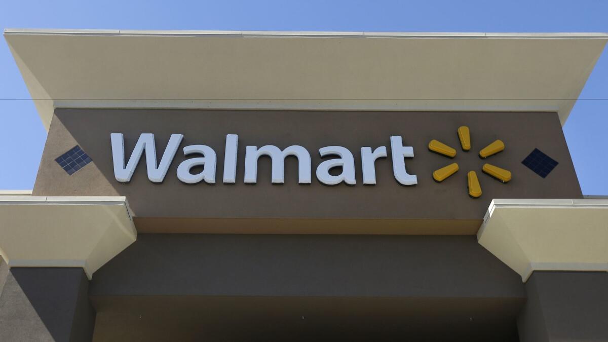 Wal-Mart's online sales soared 29% in its fourth quarter, although the company's profit was down.