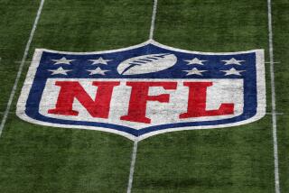 LONDON, ENGLAND - OCTOBER 13: A detailed view of the NFL logo on the field.