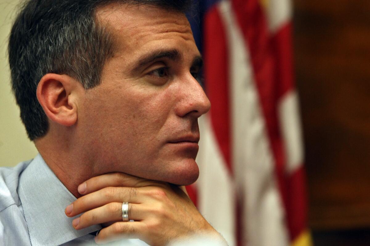 Mayor Eric Garcetti will skip a visit to Maryland and return to Los Angeles because of street protests after the George Zimmerman verdict.