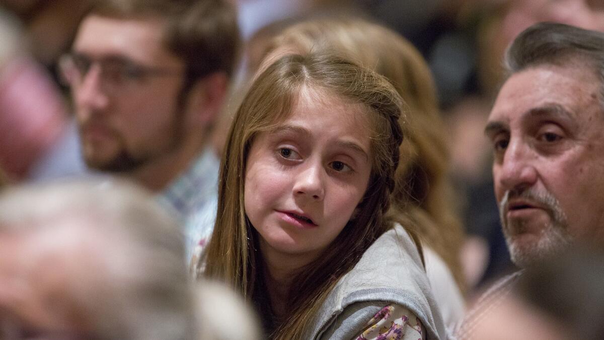 A young guest listens to Second Lady Karen Pence and her daughter Charlotte Pence discuss their children's book at the Nixon Library on March 22.