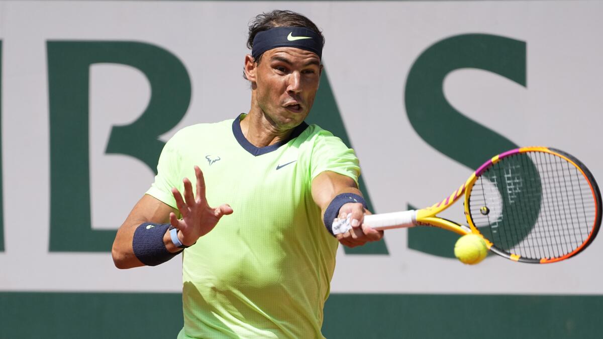 Rafael Nadal hits a forehand