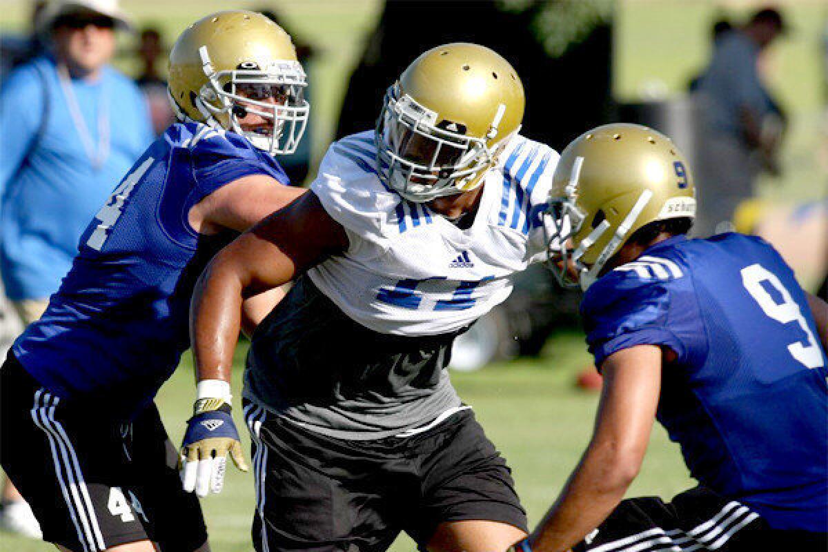 UCLA linebacker Anthony Barr suffered an undisclosed injury during practice Tuesday, but returned to practice Thursday as an observer.