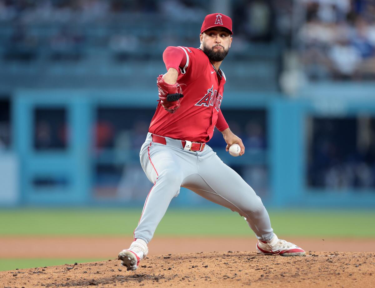 Angels pitcher Patrick Sandoval delivers during a win over the Dodgers on Friday at Dodger Stadium.