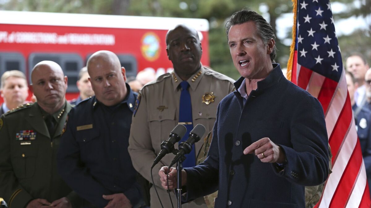 Gov. Gavin Newsom discusses emergency preparedness Tuesday during a visit to a California Department of Forestry and Fire Protection station in Colfax.