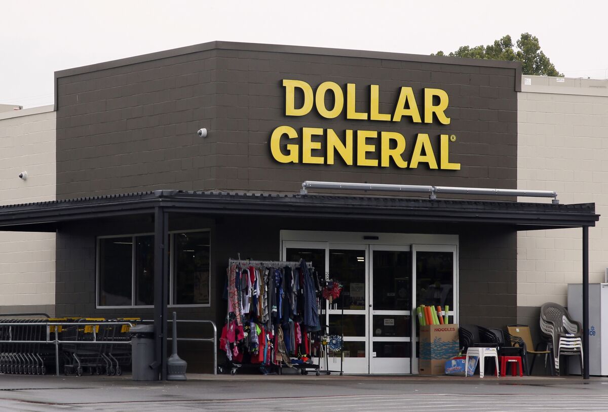 FILE- In this Aug. 3, 2017, file photo the Dollar General store is pictured in Luther, Okla. Dollar General is looking to roll out more of its Popshelf stores, where most items cost $5 or less. Dollar General said Thursday, Dec. 2, 2021, that it anticipates nearly tripling the number of Popshelf stores it has by next year and plans to have about 1,000 Popshelf locations by the end of fiscal 2025. (AP Photo/Sue Ogrocki, File)