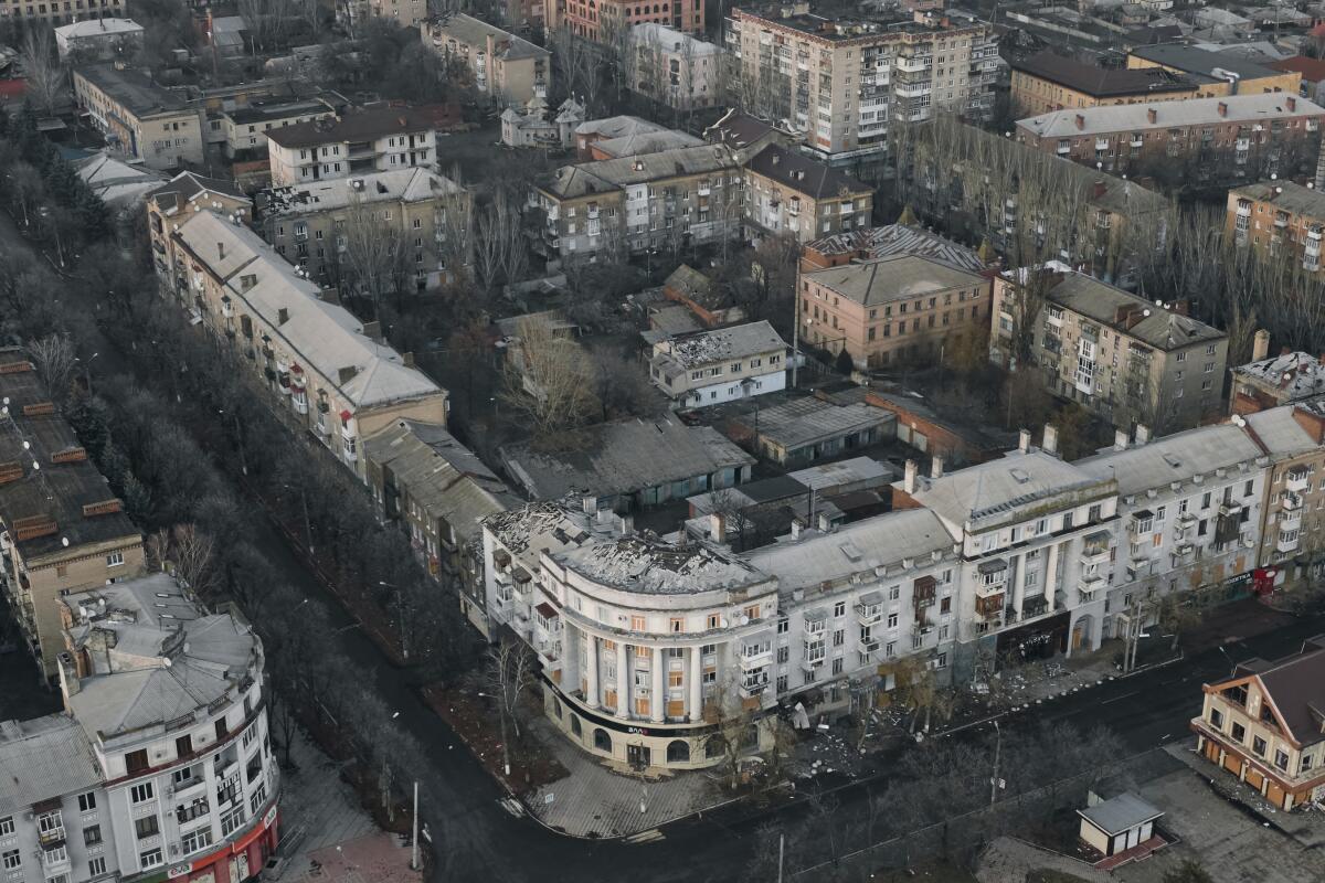 An aerial view of damaged buildings.