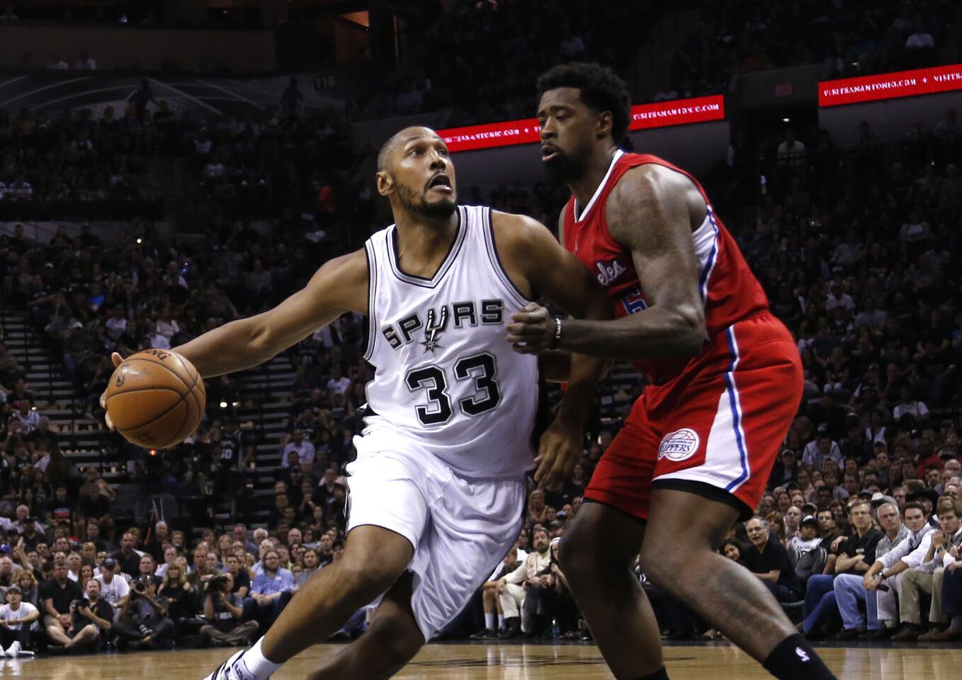 Spurs forward Boris Diaw drives against Clippers center DeAndre Jordan during Game 3 of the Western Conference quarterfinals in San Antonio on April 24.