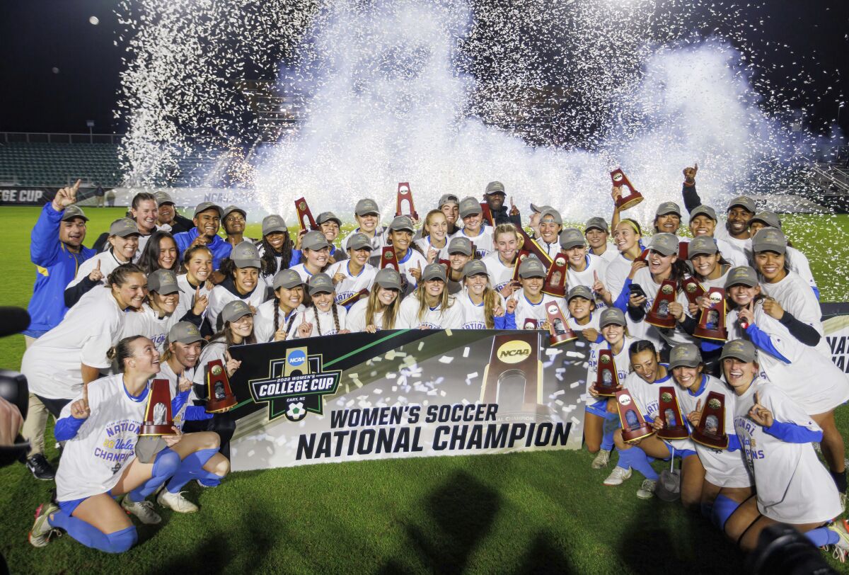 UCLA celebrates after defeating North Carolina to win the NCAA women's soccer title.
