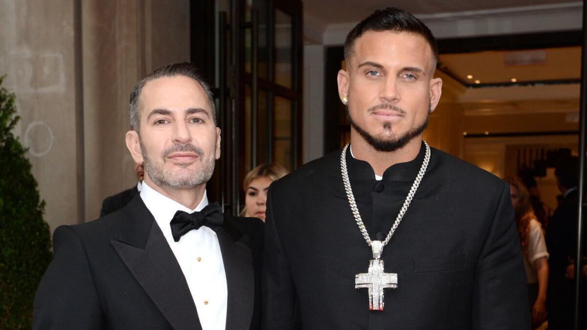 Fashion designer Marc Jacobs, left, has married boyfriend Char Defrancesco.