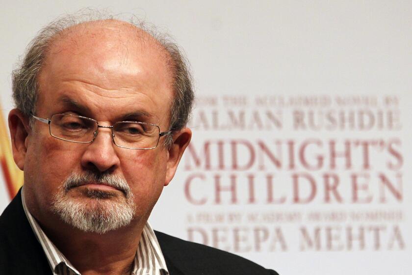 FILE - In this Jan. 29 , 2013, file photo, author Salman Rushdie attends a promotional event of "Midnight's Children" in Mumbai, India. The author best known for “Midnight’s Children” and “The Satanic Verses” is working on a narrative set against “the panorama” of American life since Obama’s arrival at the White House in 2009. The novel is called “The Golden House” and is scheduled for September 2017. (AP Photo/Rajanish Kakade, File)