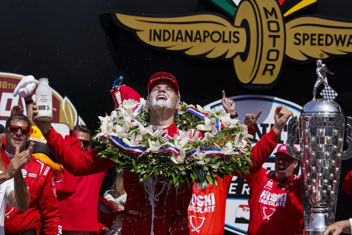 Marcus Ericsson celebrates after winning the Indianapolis 500.